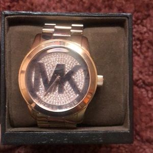 MK rose gold women’s watch.Diamond face. monogram